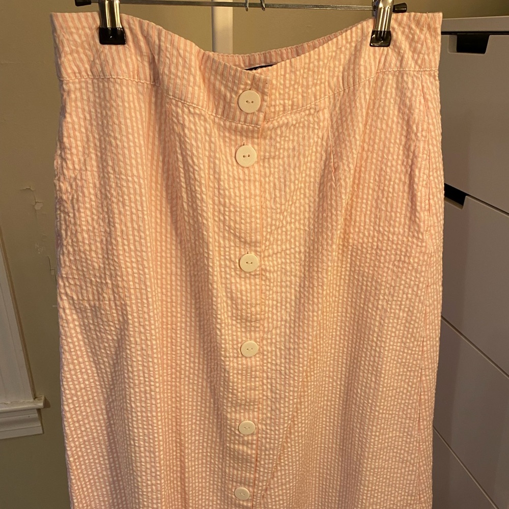 Long pink and white striped skirt with buttons